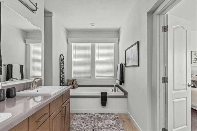 The TU3076A MEGA TUNDRA Primary Bathroom. This Manufactured Mobile Home features 4 bedrooms and 2 baths.