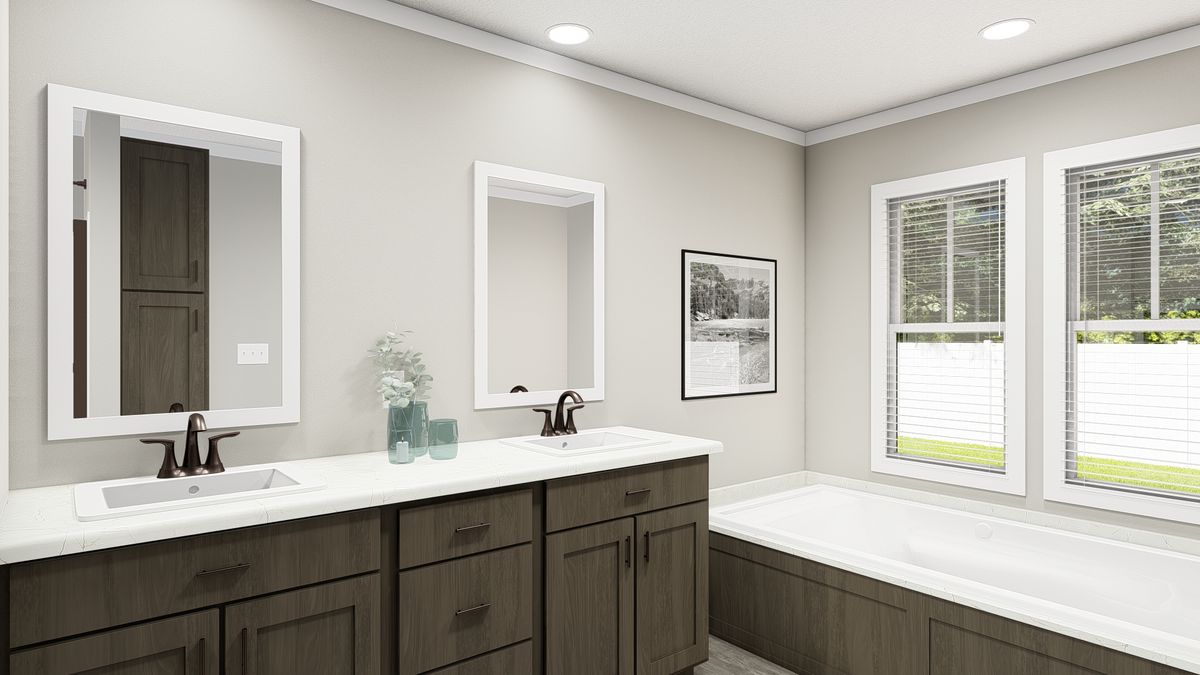 The THE ALEXANDER Primary Bathroom. This Manufactured Mobile Home features 3 bedrooms and 2 baths.