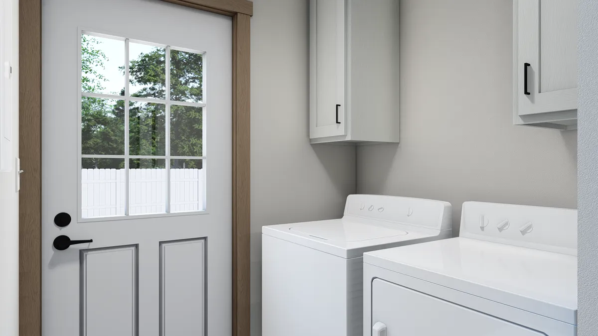 The ANNIE Utility Room. This Manufactured Mobile Home features 3 bedrooms and 2 baths.