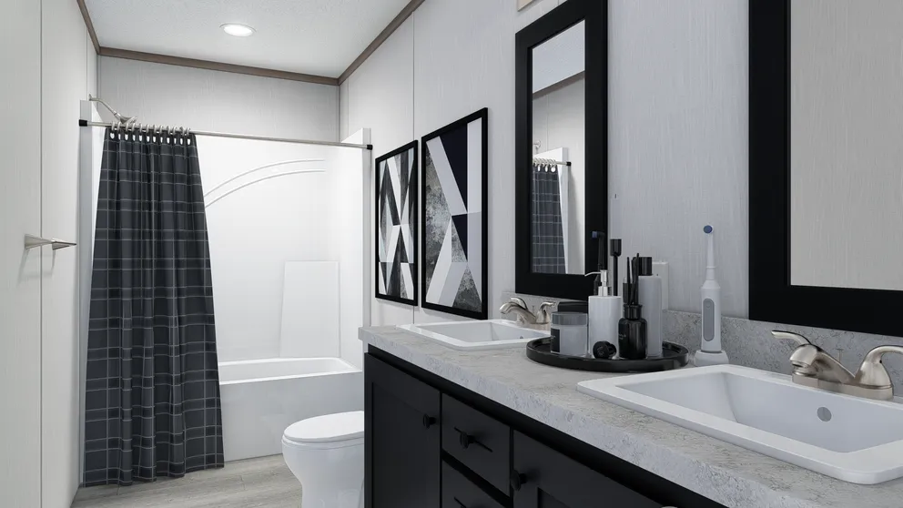 The 4028-E751 THE PULSE Primary Bathroom. This Manufactured Mobile Home features 3 bedrooms and 2 baths.