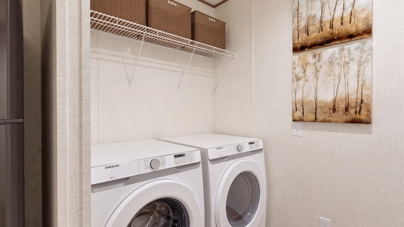 The CYPRESS Utility Room. This Manufactured Mobile Home features 4 bedrooms and 2 baths.