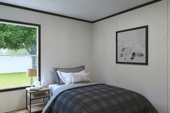 The BALANCE Bedroom. This Manufactured Mobile Home features 3 bedrooms and 2 baths.