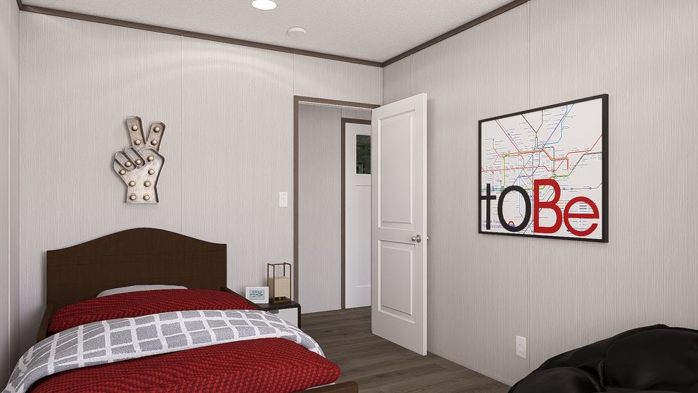 The LEGEND ANNIVERSARY 16X76 Bedroom. This Manufactured Mobile Home features 3 bedrooms and 2 baths.