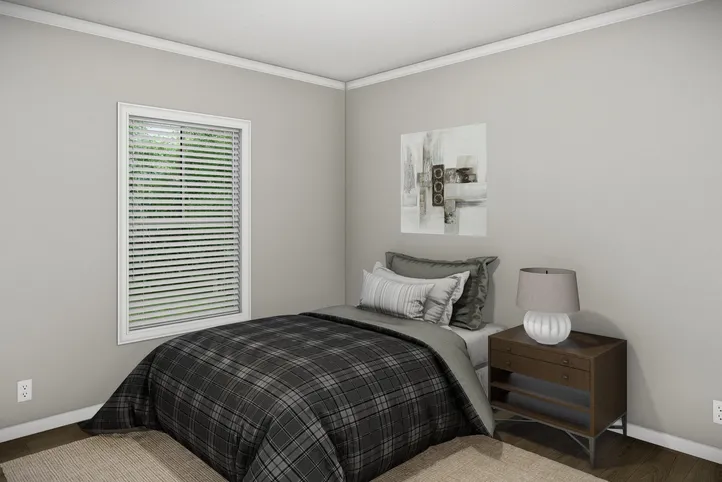 The HUXTON II Guest Bedroom. This Manufactured Mobile Home features 4 bedrooms and 2 baths.