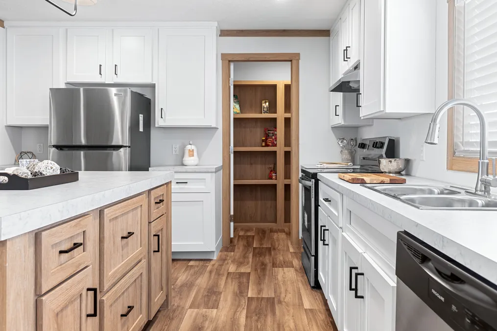 The HARPER Kitchen. This Manufactured Mobile Home features 3 bedrooms and 2 baths.