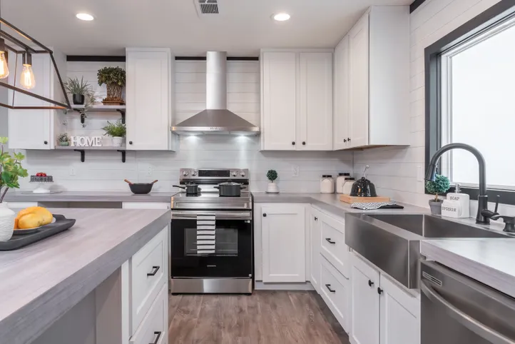 The BREEZE FARMHOUSE Kitchen. This Manufactured Mobile Home features 3 bedrooms and 2 baths.