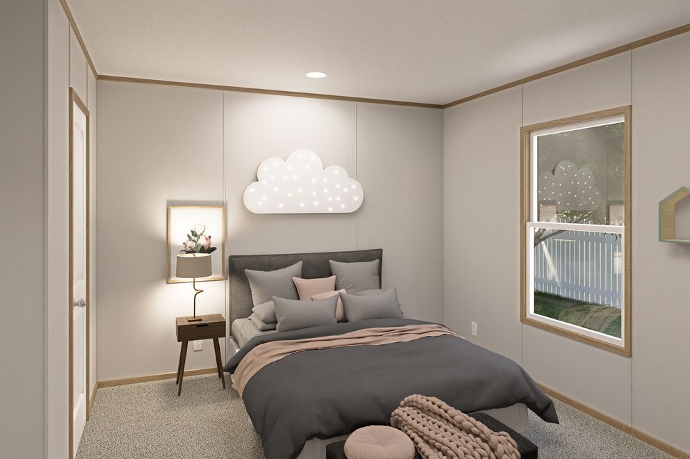 The THE EAGLE 60 Bedroom. This Manufactured Mobile Home features 3 bedrooms and 2 baths.