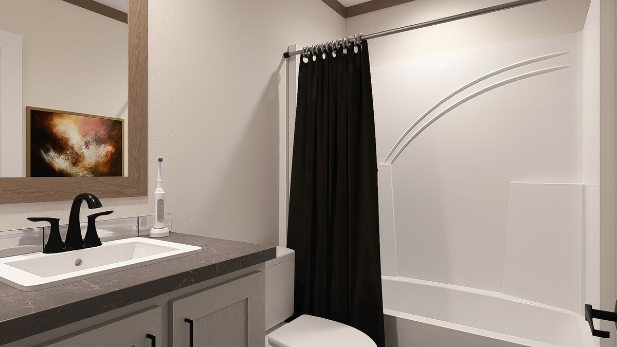 The LEXI Guest Bathroom. This Manufactured Mobile Home features 3 bedrooms and 2 baths.