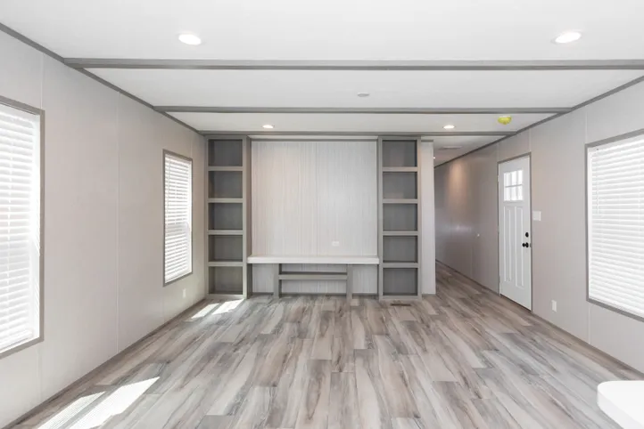 The THE ANNIVERSARY 76 Living Room. This Manufactured Mobile Home features 3 bedrooms and 2 baths.