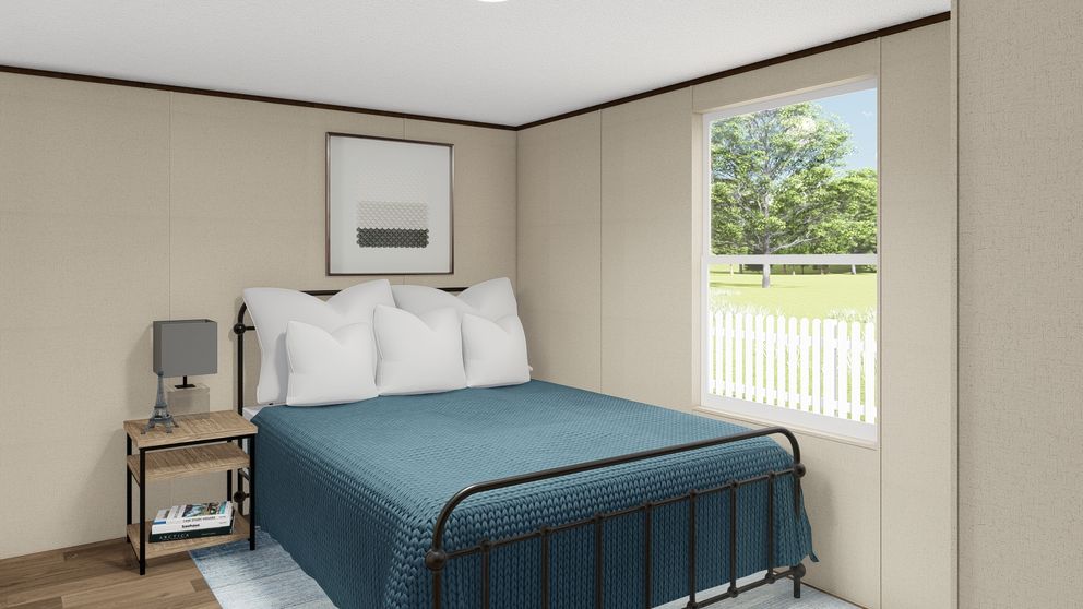 The GRAND Guest Bedroom. This Manufactured Mobile Home features 4 bedrooms and 2 baths.