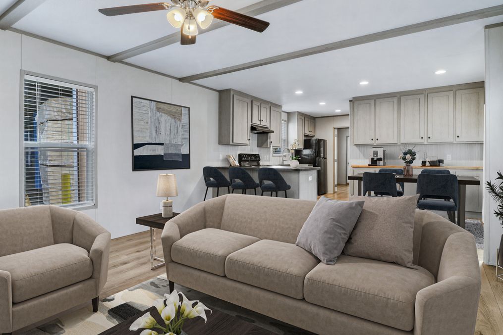 The ANNIVERSARY 16763A Living Room. This Manufactured Mobile Home features 3 bedrooms and 2 baths.