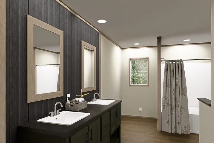 The SUMMIT Primary Bathroom. This Manufactured Mobile Home features 4 bedrooms and 3 baths.