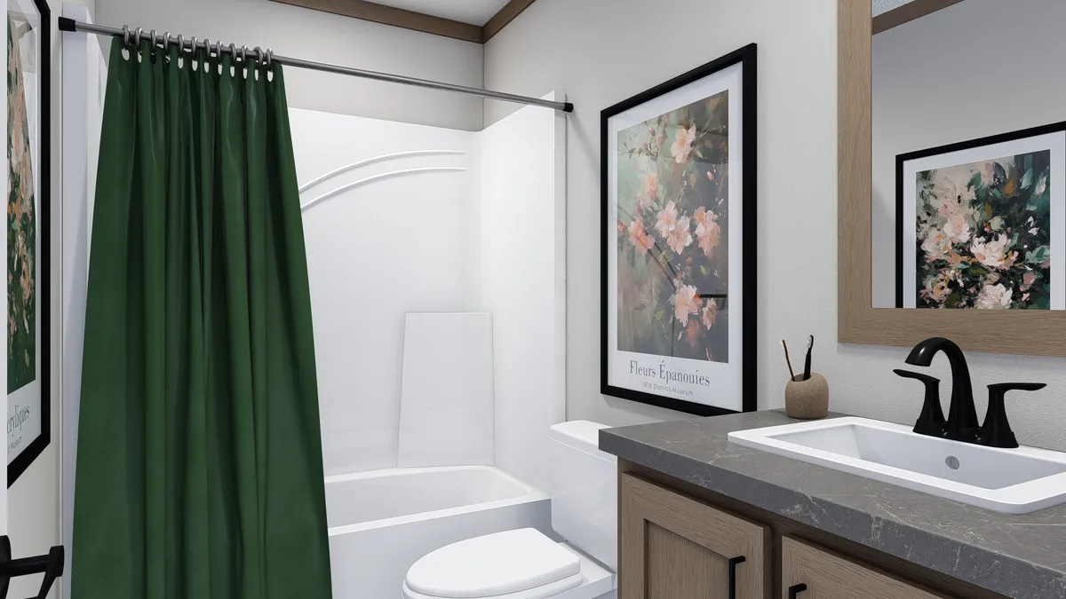 The TRINITY 60 Guest Bathroom. This Manufactured Mobile Home features 2 bedrooms and 2 baths.