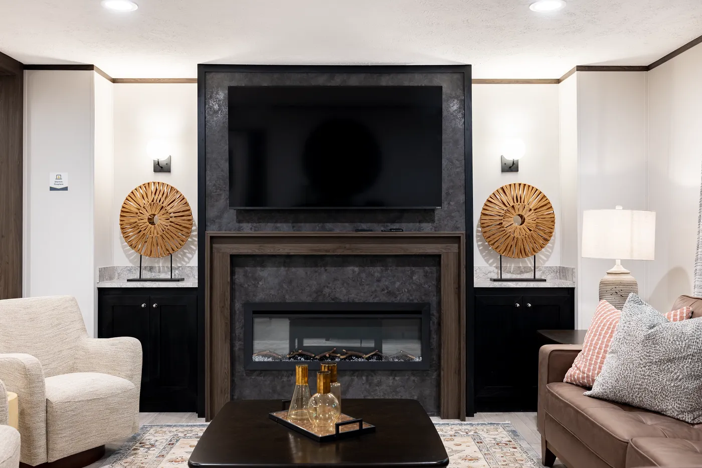 The CRESTWOOD Living Room. This Manufactured Mobile Home features 3 bedrooms and 2 baths.