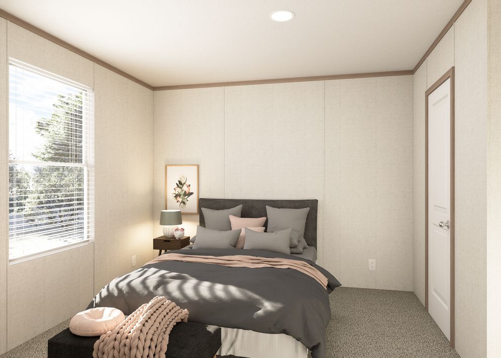The THE RESERVE 60 Bedroom. This Manufactured Mobile Home features 3 bedrooms and 2 baths.