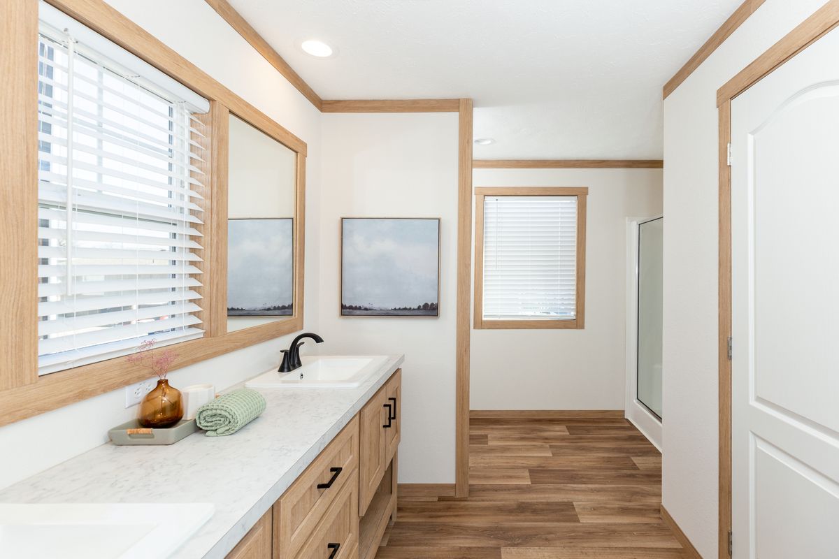 The WILDER Primary Bathroom. This Manufactured Mobile Home features 3 bedrooms and 2 baths.