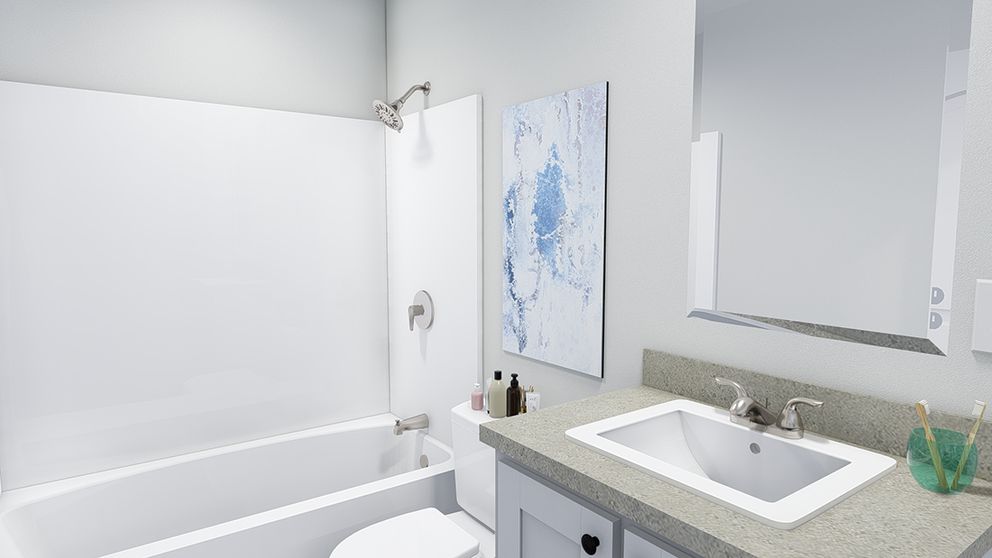 The SWEET DREAMS Guest Bathroom. This Manufactured Mobile Home features 3 bedrooms and 2 baths.