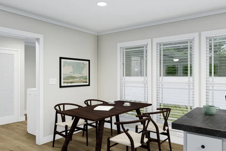 The CLASSIC 60B Dining Room. This Manufactured Mobile Home features 3 bedrooms and 2 baths.