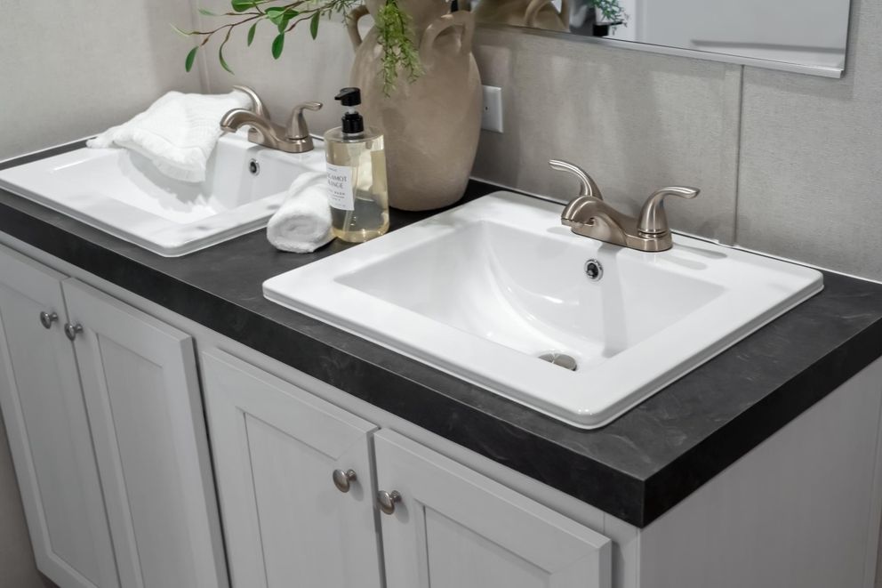 The ELEMENT Primary Bathroom. This Manufactured Mobile Home features 3 bedrooms and 2 baths.
