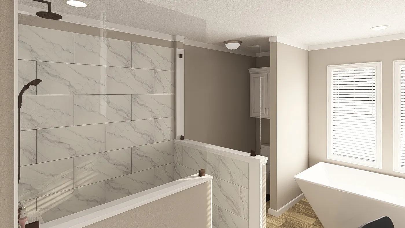 The THE BIG EASY Primary Bathroom. This Manufactured Mobile Home features 4 bedrooms and 3 baths.