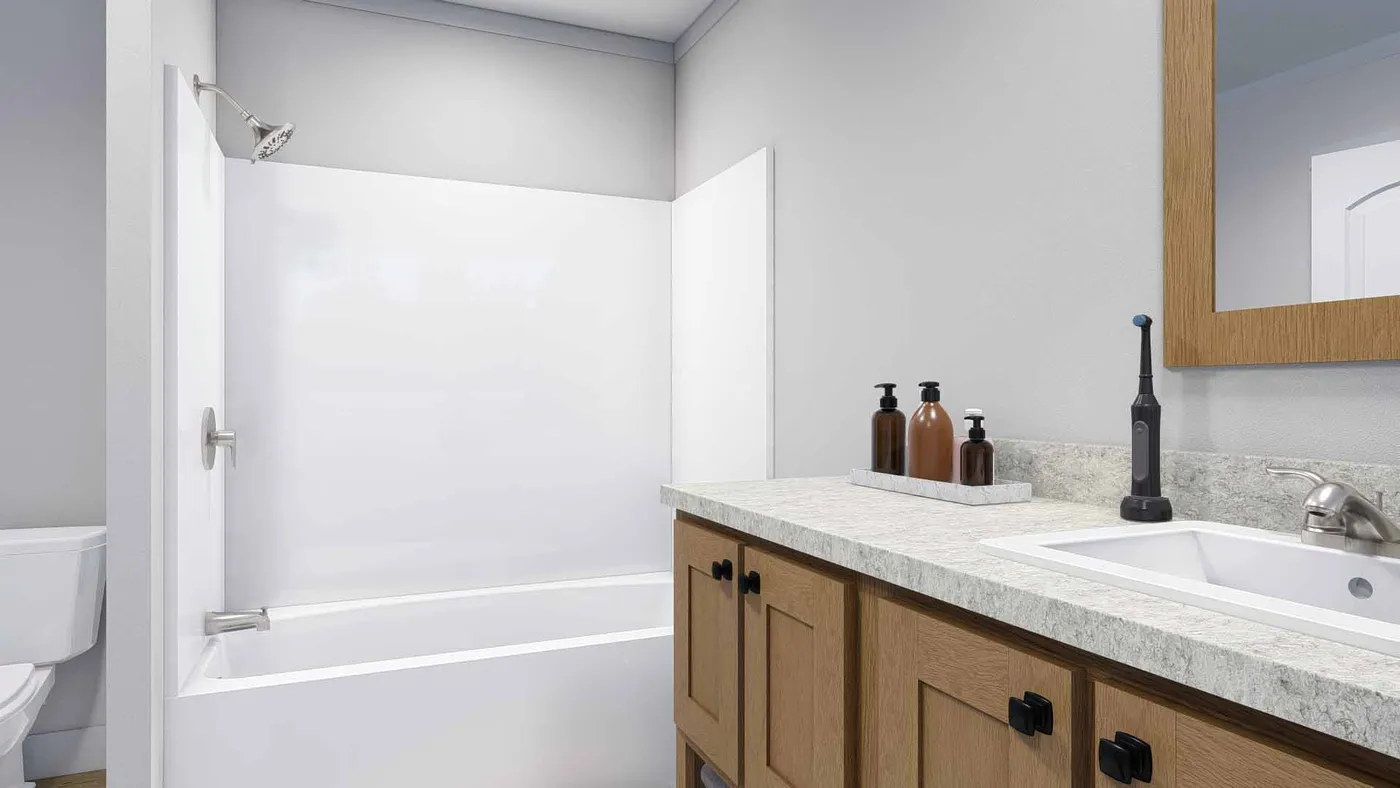 The YELLOW SUBMARINE Guest Bathroom. This Manufactured Mobile Home features 5 bedrooms and 2 baths.