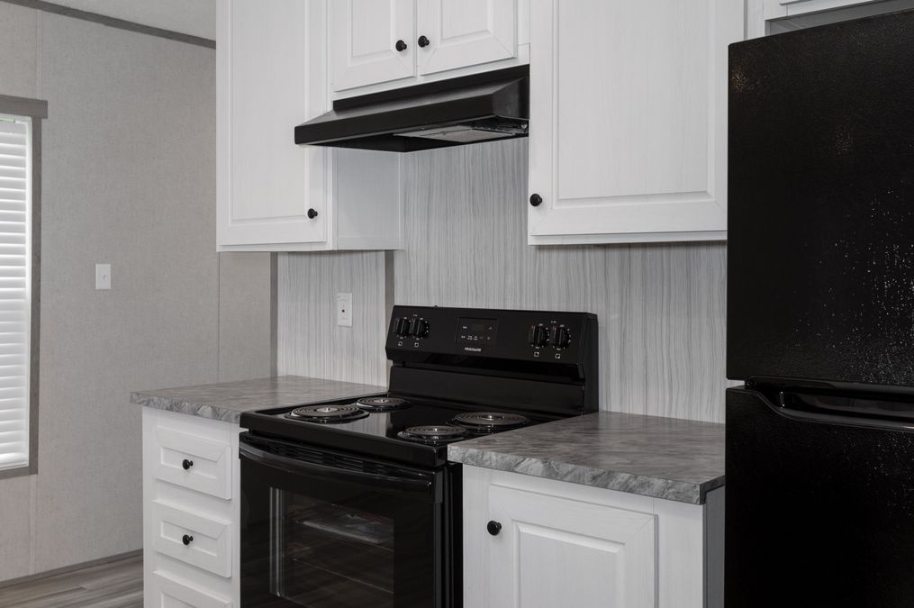 The MAYNARDVILLE CLASSIC 56 Kitchen. This Manufactured Mobile Home features 2 bedrooms and 2 baths.