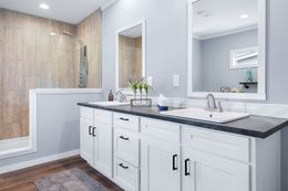 The THE ATLAS Primary Bathroom. This Manufactured Mobile Home features 4 bedrooms and 3 baths.