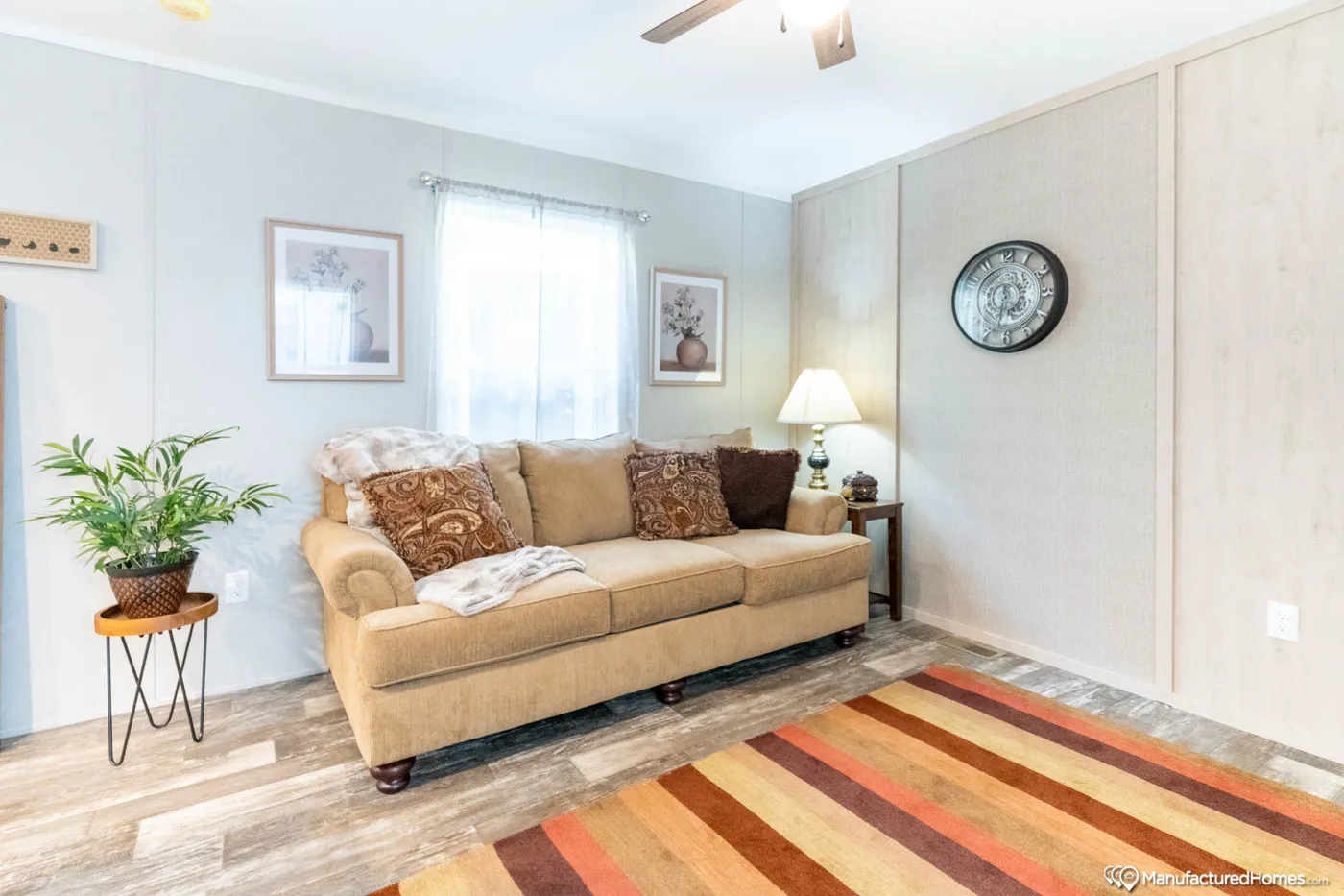 The TOPAZ 70 Living Room. This Manufactured Mobile Home features 3 bedrooms and 2 baths.