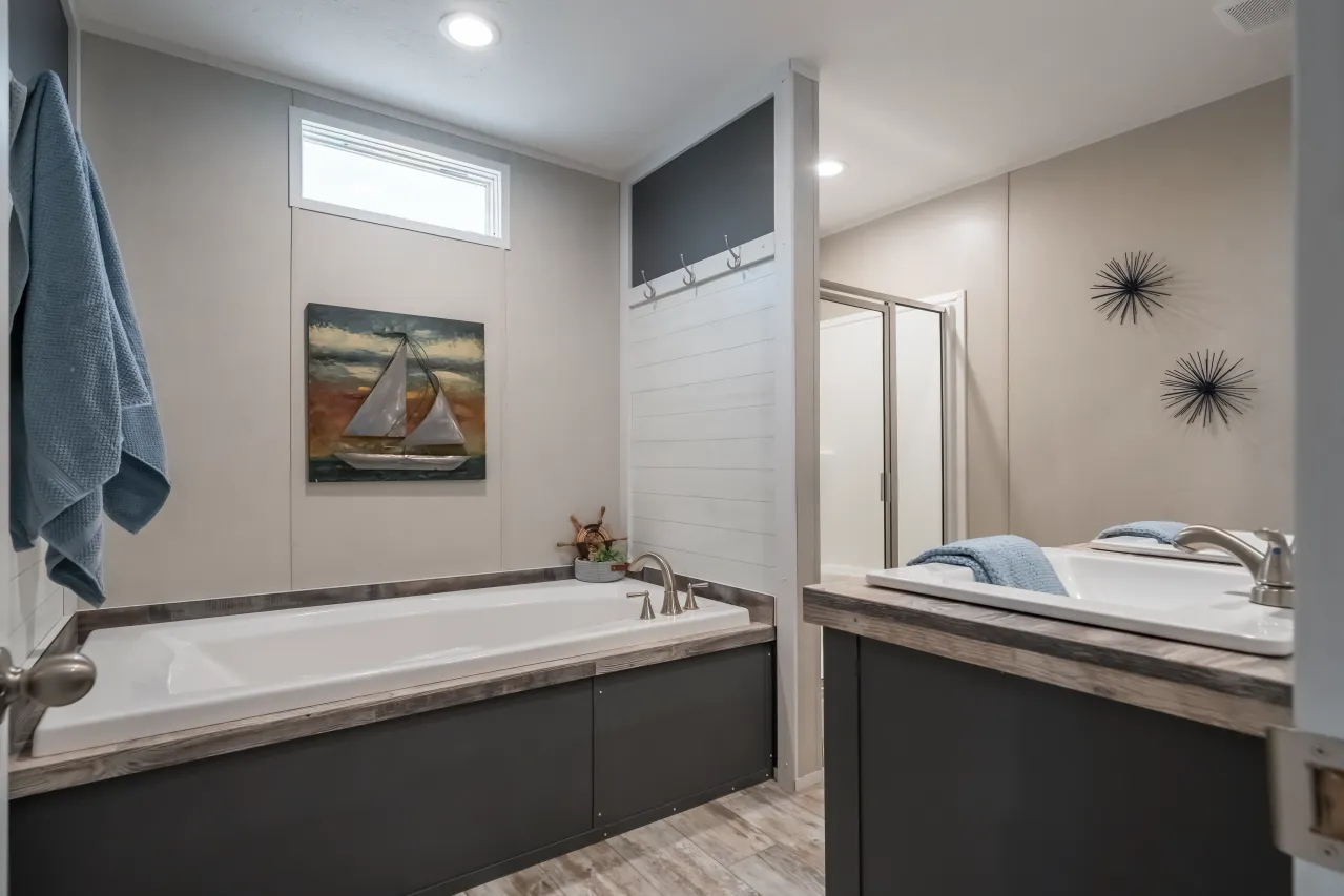 The ANNIVERSARY CHOICE Exterior. This Manufactured Mobile Home features 3 bedrooms and 2 baths.