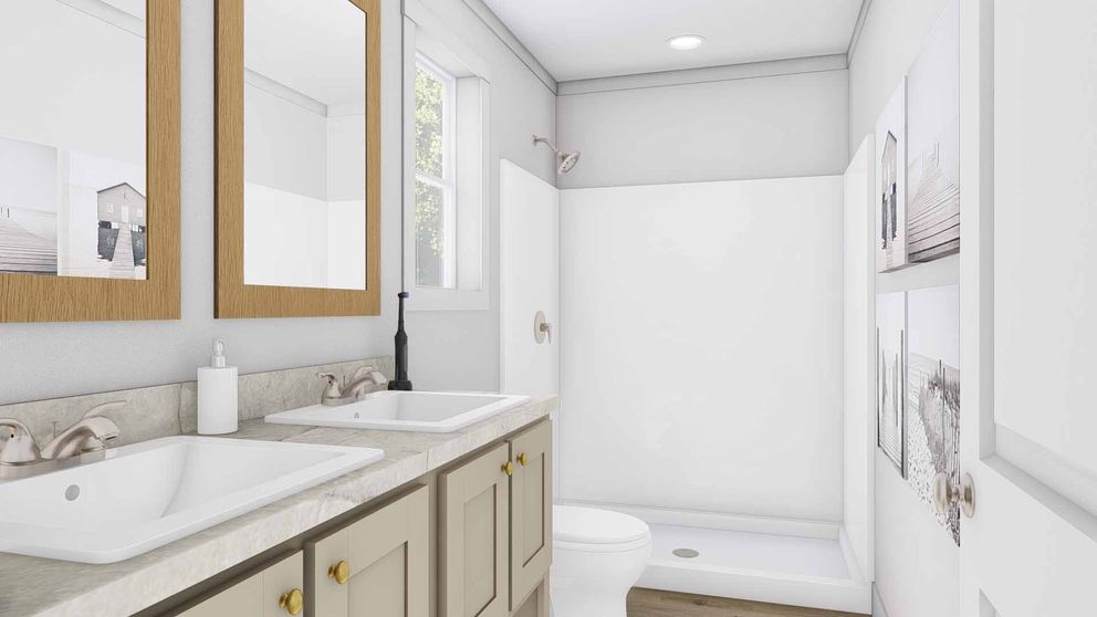 The PURPLE RAIN Primary Bathroom. This Manufactured Mobile Home features 3 bedrooms and 2 baths.