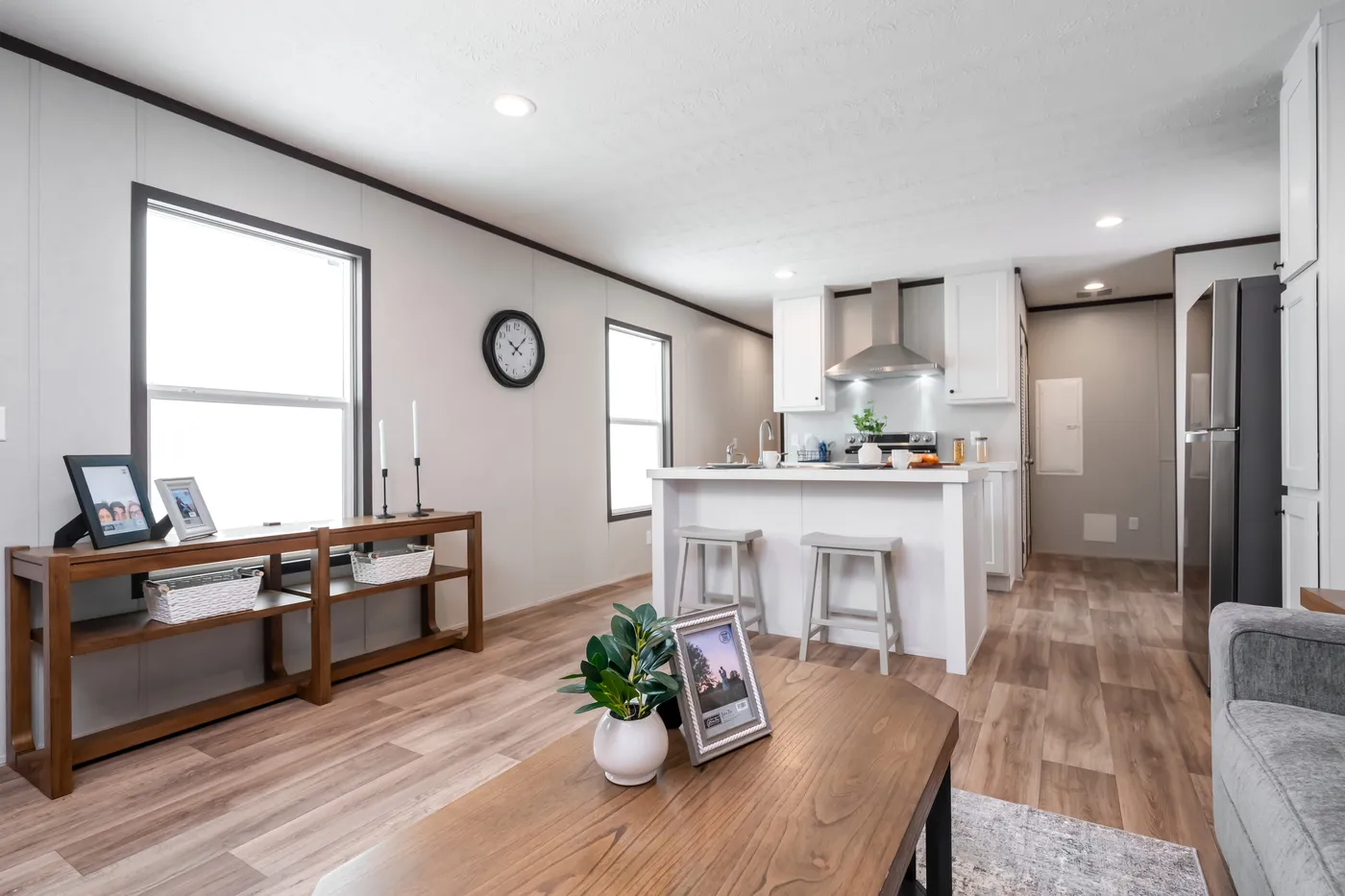 The DYNAMIC Living Room. This Manufactured Mobile Home features 3 bedrooms and 2 baths.