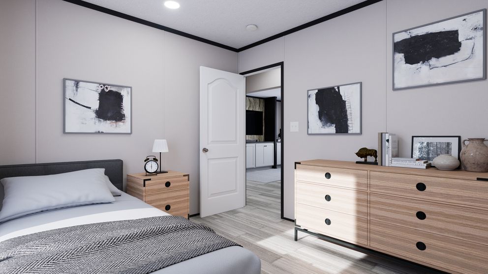 The THE MOUNTAINEER 56 Bedroom. This Manufactured Mobile Home features 3 bedrooms and 2 baths.