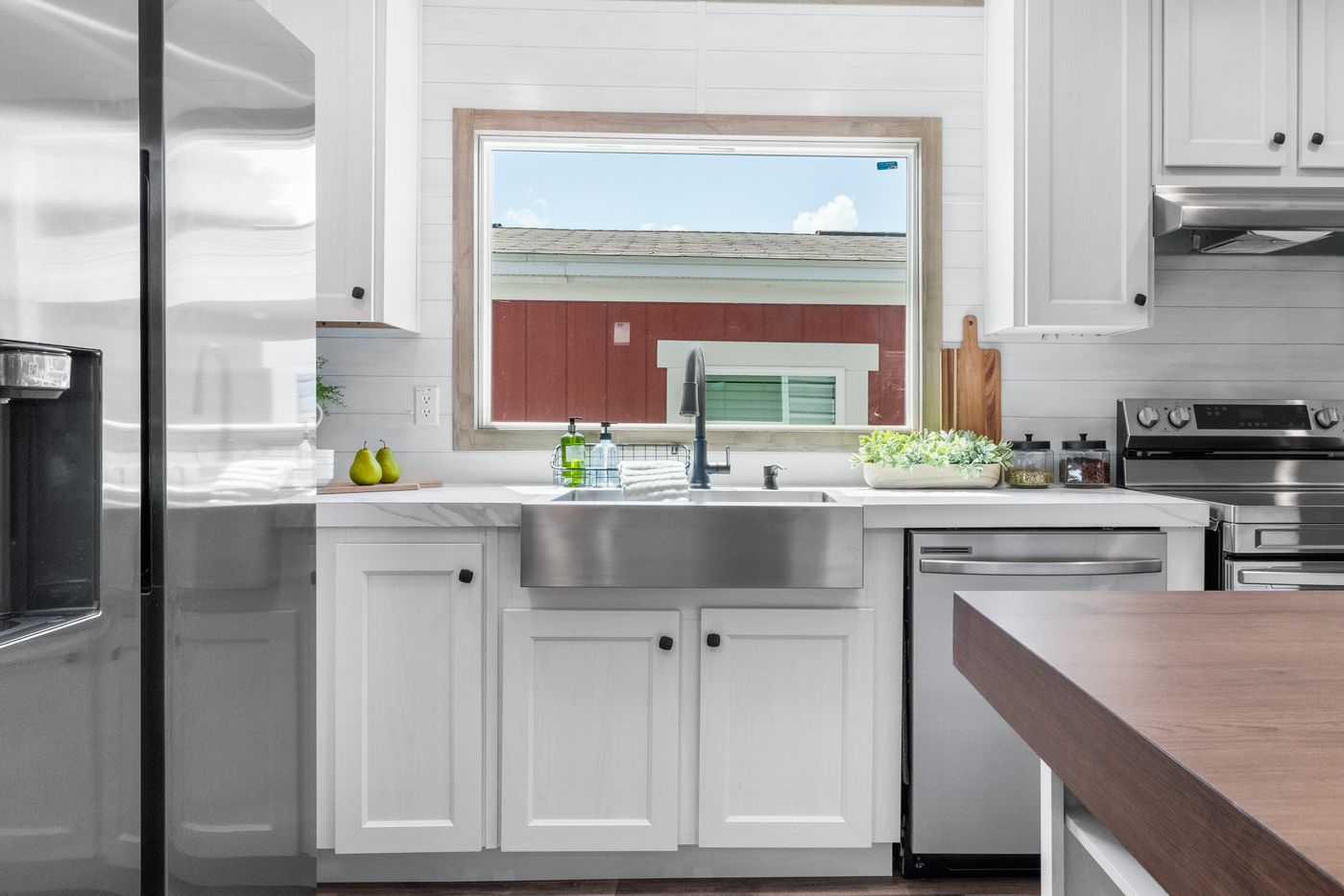 The THE REAL DEAL Kitchen. This Manufactured Mobile Home features 3 bedrooms and 2 baths.