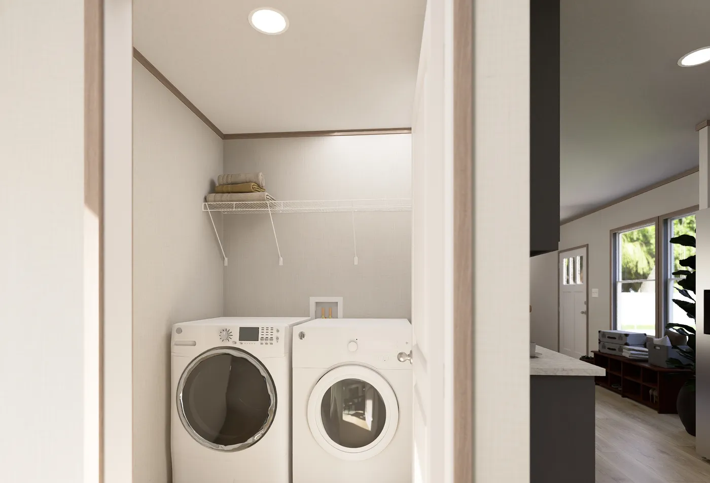 The ULTRA FLEX ANNIVERSARY PLUS Utility Room. This Manufactured Mobile Home features 3 bedrooms and 2 baths.