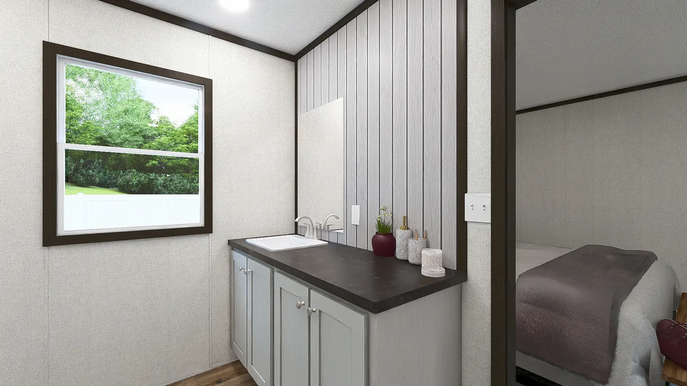 The DYNAMIC Primary Bathroom. This Manufactured Mobile Home features 3 bedrooms and 2 baths.