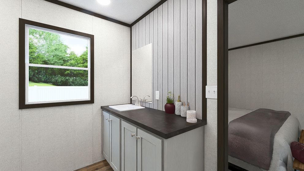 The DYNAMIC Primary Bathroom. This Manufactured Mobile Home features 3 bedrooms and 2 baths.