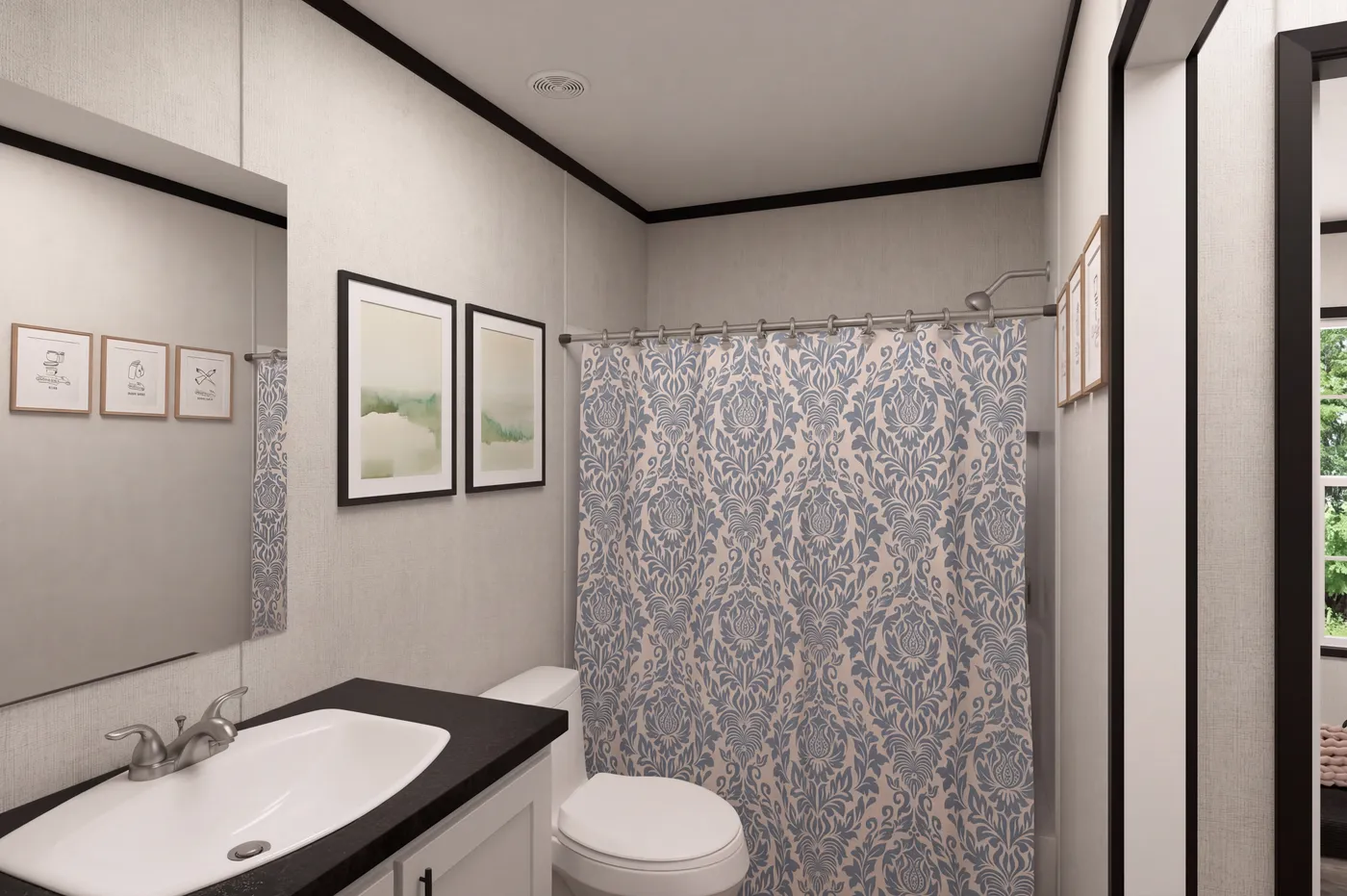 The THE MOUNTAINEER 48 Guest Bathroom. This Manufactured Mobile Home features 3 bedrooms and 2 baths.