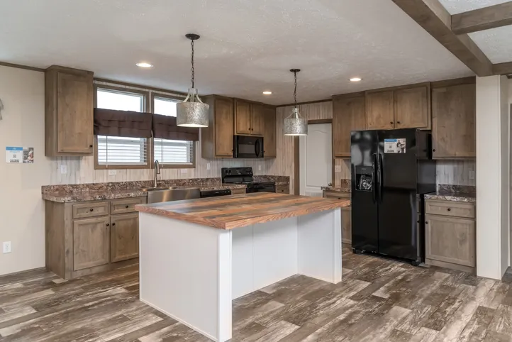 The NUMBER ONE Exterior. This Manufactured Mobile Home features 3 bedrooms and 2 baths.