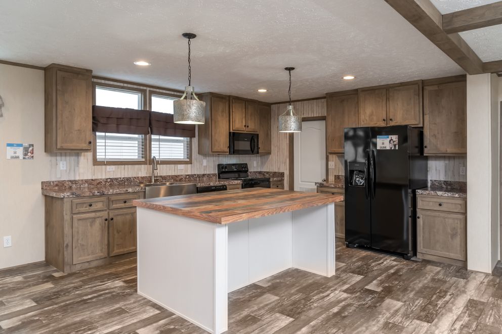 The NUMBER ONE Exterior. This Manufactured Mobile Home features 3 bedrooms and 2 baths.