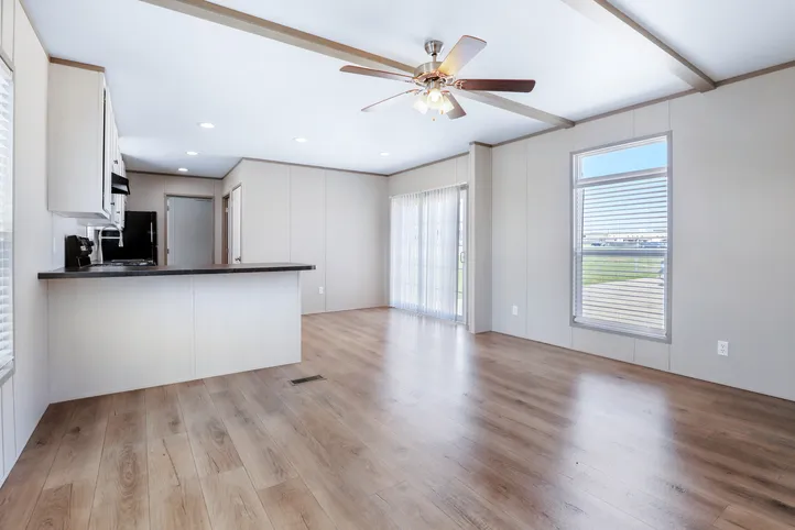 The ANNIVERSARY 16602A Living Room. This Manufactured Mobile Home features 2 bedrooms and 2 baths.