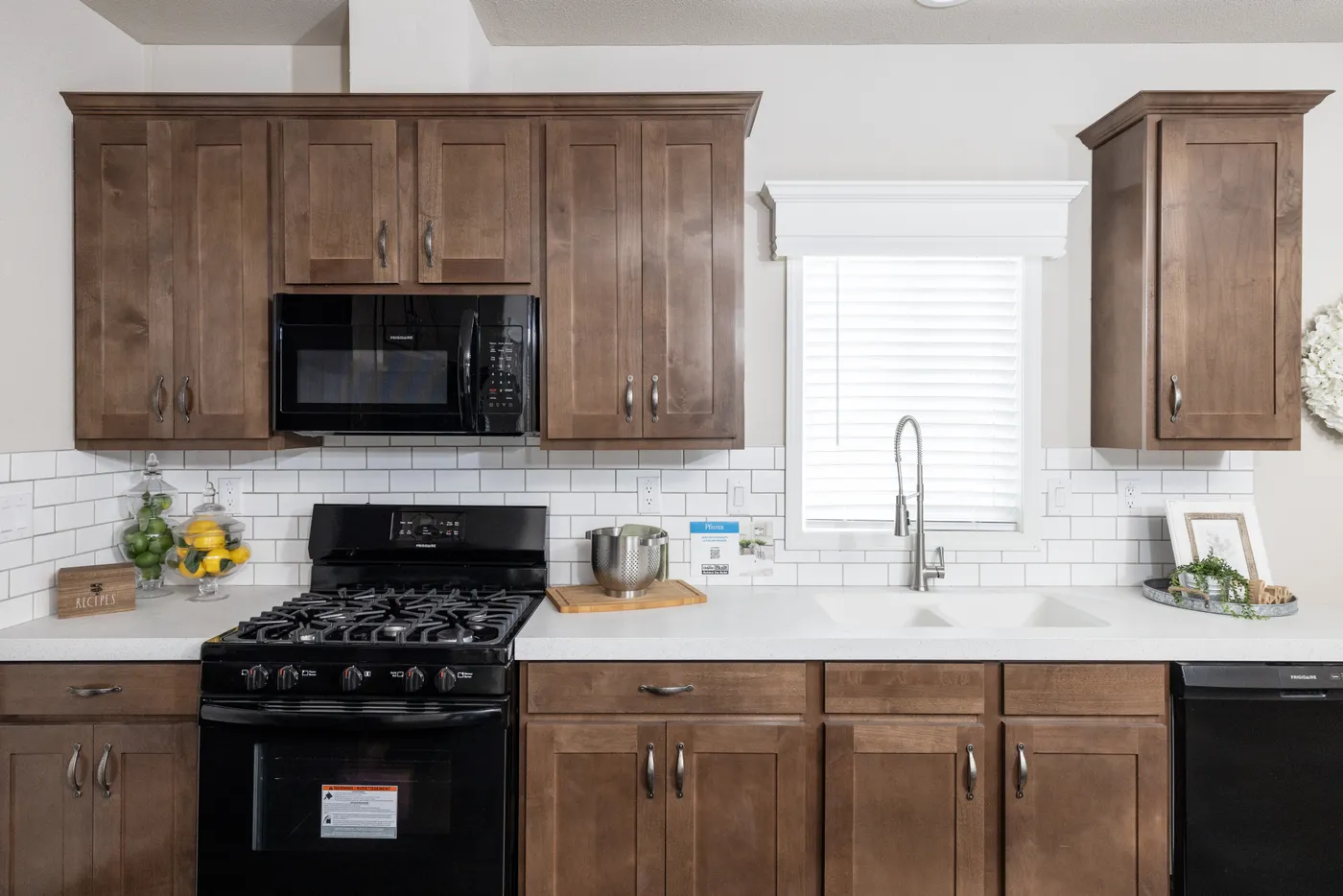 The FAIRPOINT 24523K Kitchen. This Manufactured Mobile Home features 3 bedrooms and 2 baths.