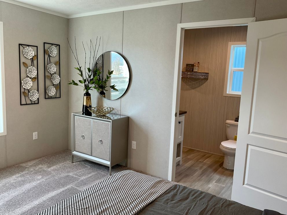 The PERIDOT 66 Primary Bedroom.