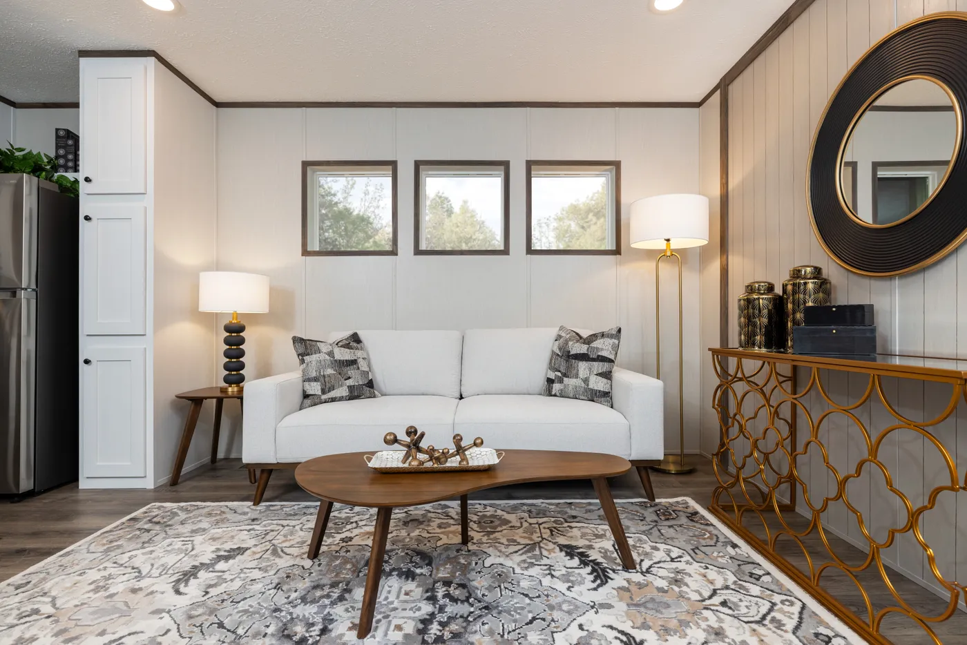 The INTUITION Living Room. This Manufactured Mobile Home features 3 bedrooms and 2 baths.
