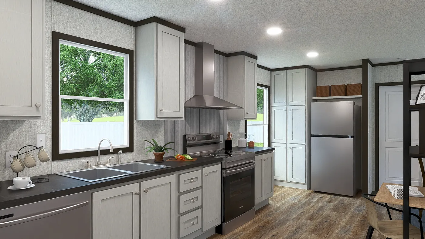 The GRAND Kitchen. This Manufactured Mobile Home features 3 bedrooms and 2 baths.