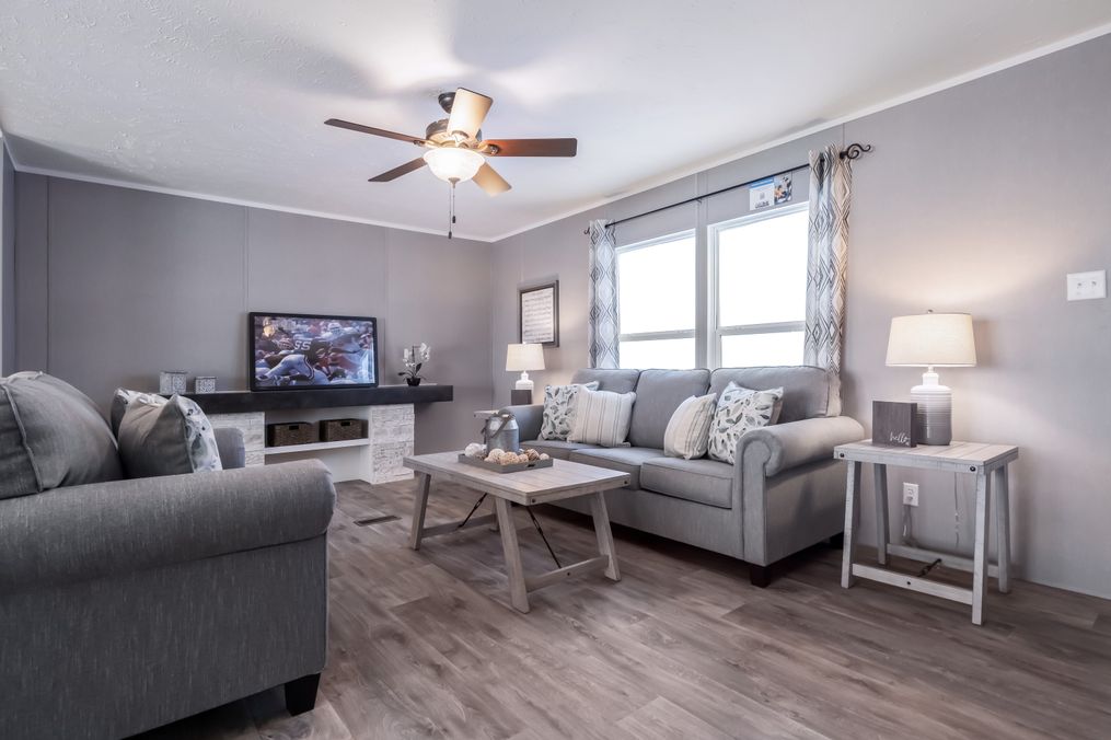 The TRADITION 52B Living Room. This Manufactured Mobile Home features 3 bedrooms and 2 baths.