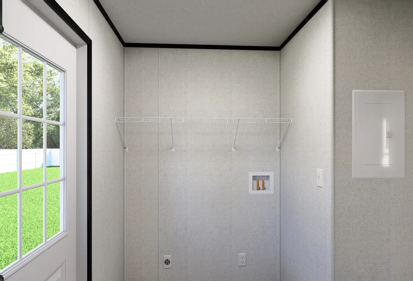 The OASIS Utility Room. This Manufactured Mobile Home features 3 bedrooms and 2 baths.