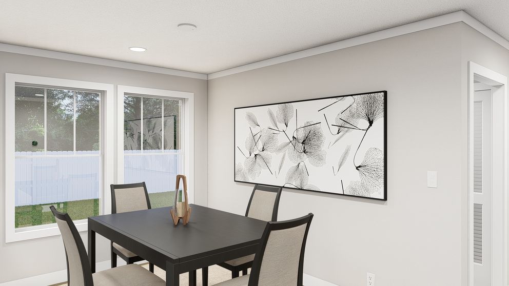 The LIMELIGHT Dining Area. This Manufactured Mobile Home features 3 bedrooms and 2 baths.