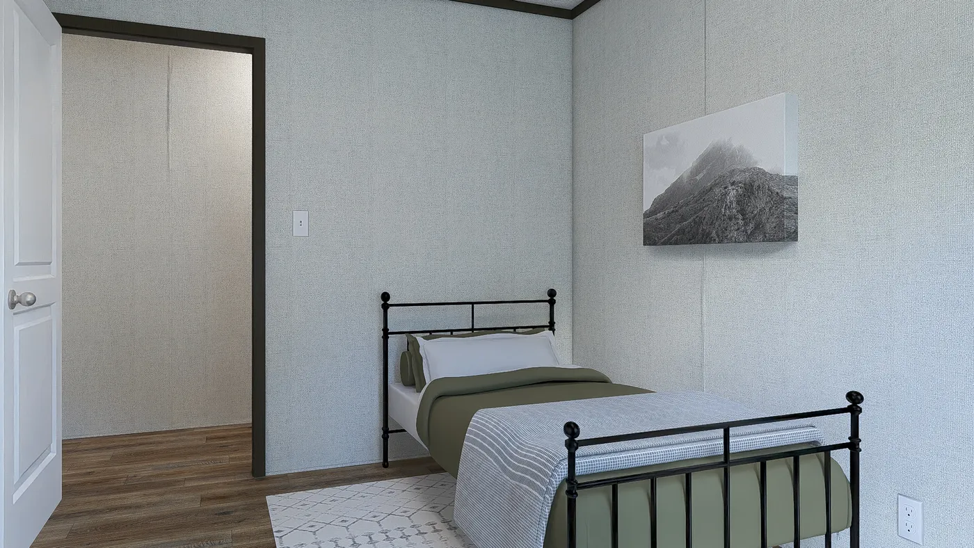 The ESSENCE Guest Bedroom. This Manufactured Mobile Home features 3 bedrooms and 2 baths.