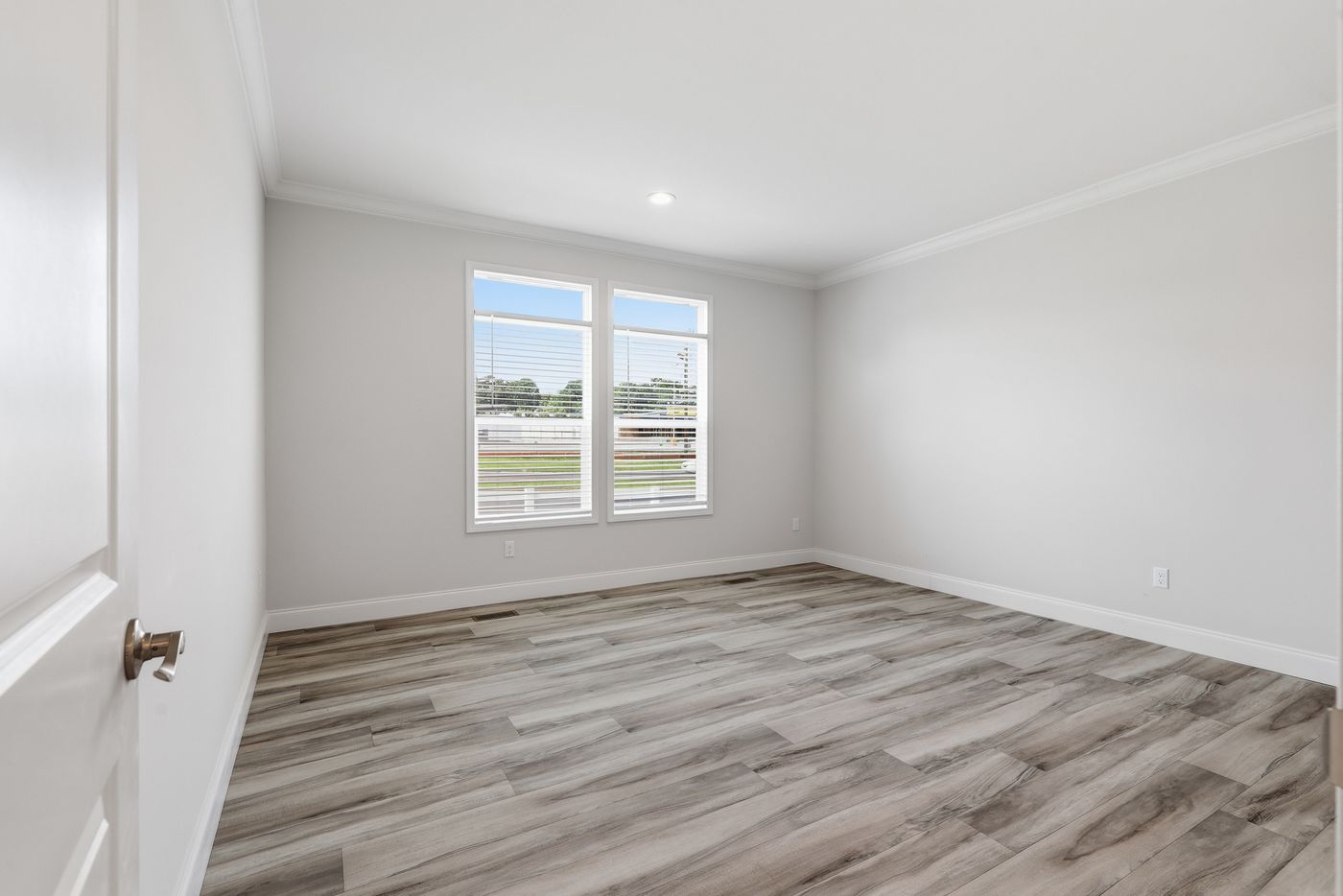 The THE SUMMIT Guest Bedroom. This Manufactured Mobile Home features 3 bedrooms and 2 baths.