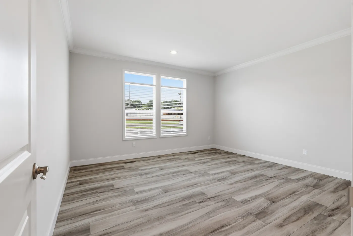 The THE SUMMIT Guest Bedroom. This Manufactured Mobile Home features 3 bedrooms and 2 baths.